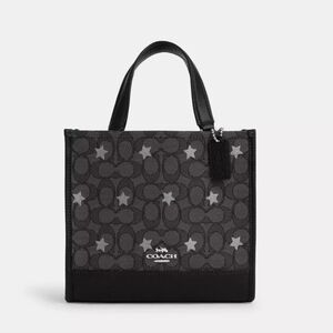 Coach Dempsey Tote Signature Jacquard with Star Embroidery.